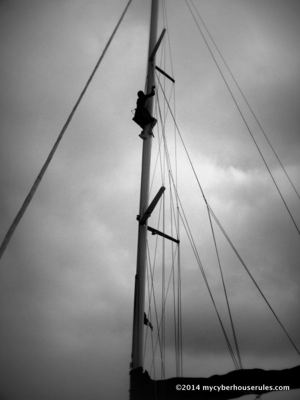 Climbing up the mast at anchorage